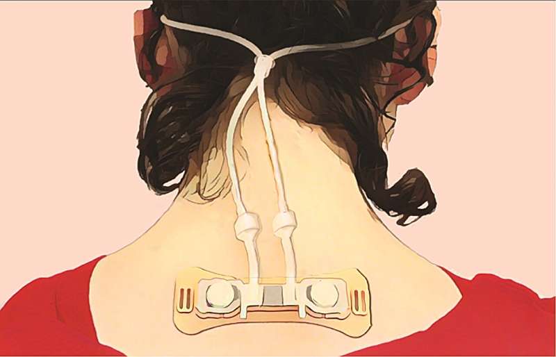 Discreet device on the nape of the neck, which recorded airflow through soft tubes connected to the nose. Credit: Soroka et al. Current Biology Humans have unique breathing "fingerprints" that may signal health status